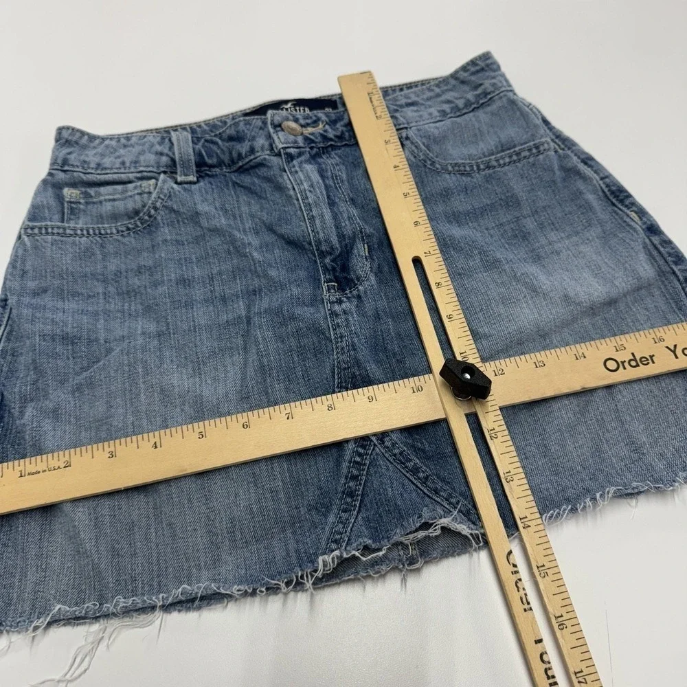 Hollister Denim Skirt Womens Size 5‎ W27 Blue Distressed Raw Hem Mini Y2K